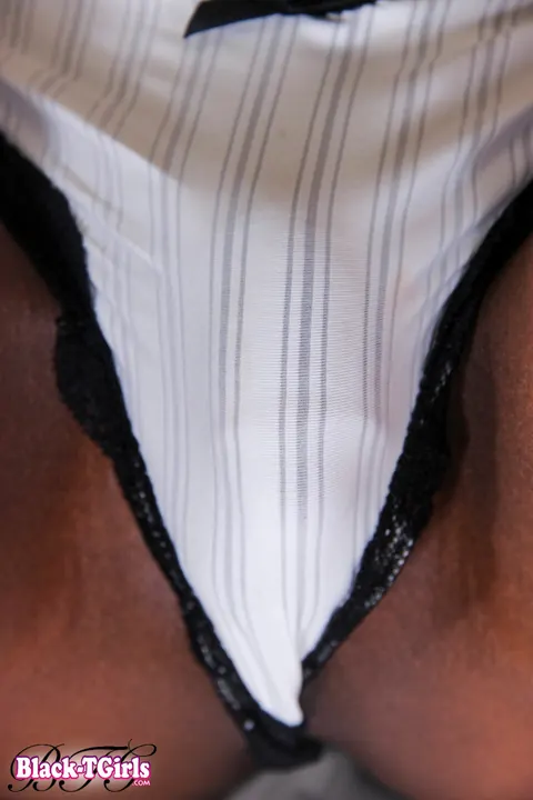 Ebony Trans Woman with Small Tits Strips Nude and Poses – photo 12 of 16