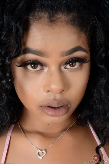 Busty Ebony Babe Spreads Her Shaved Pussy and Asshole