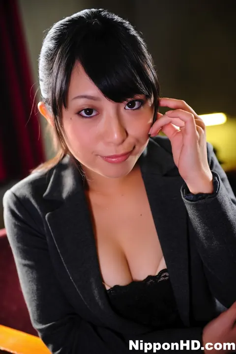 Japanese MILF in Uniform Adjusts Her Glasses at Her Desk – photo 10 of 12