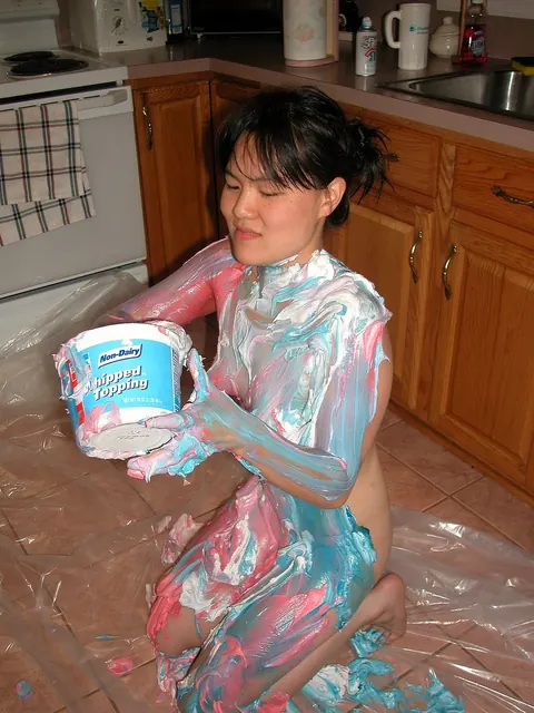 Asian Woman Spreads Her Pussy on the Kitchen Counter – photo 11 of 21
