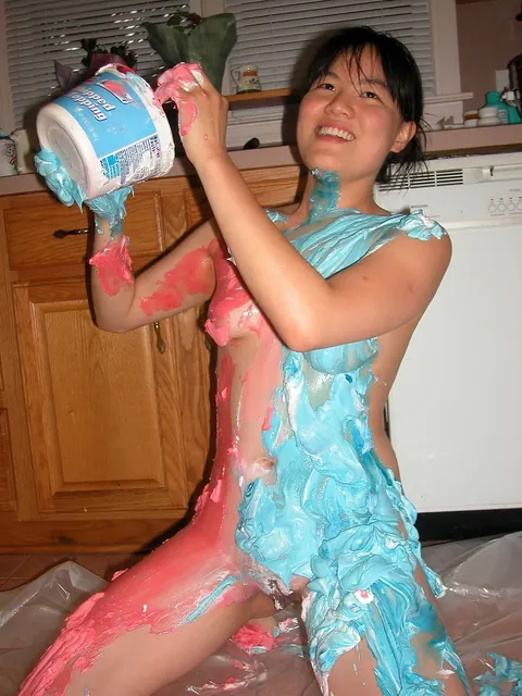 Asian Woman Spreads Her Pussy on the Kitchen Counter – photo 7 of 21