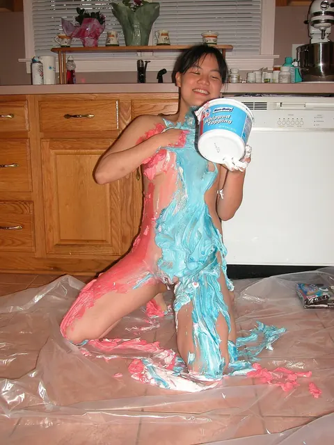 Asian Woman Spreads Her Pussy on the Kitchen Counter – photo 6 of 21