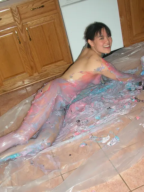 Asian Woman Spreads Her Pussy on the Kitchen Counter – photo 19 of 21