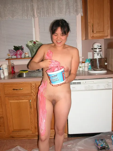 Asian Woman Spreads Her Pussy on the Kitchen Counter – photo 2 of 21
