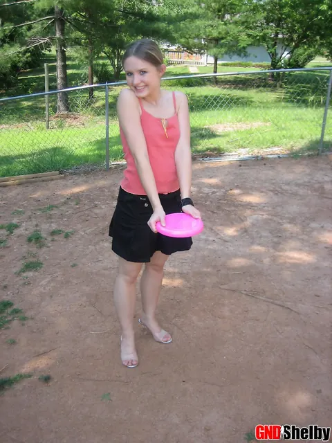 Amateur Woman in a Skirt Flashes Her Panties Outdoors – photo 10 of 12
