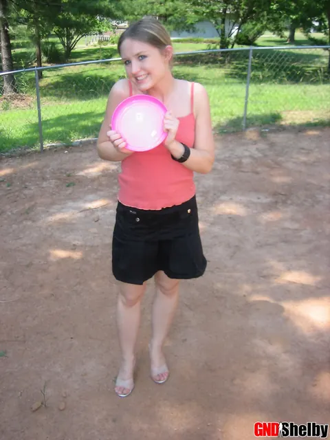 Amateur Woman in a Skirt Flashes Her Panties Outdoors – photo 9 of 12