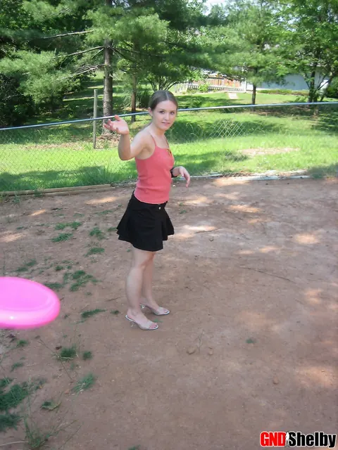 Amateur Woman in a Skirt Flashes Her Panties Outdoors – photo 7 of 12