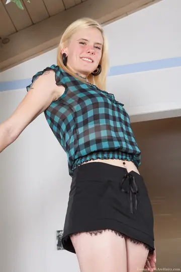 Tall Blonde Undresses and Spreads Her Hairy Pussy