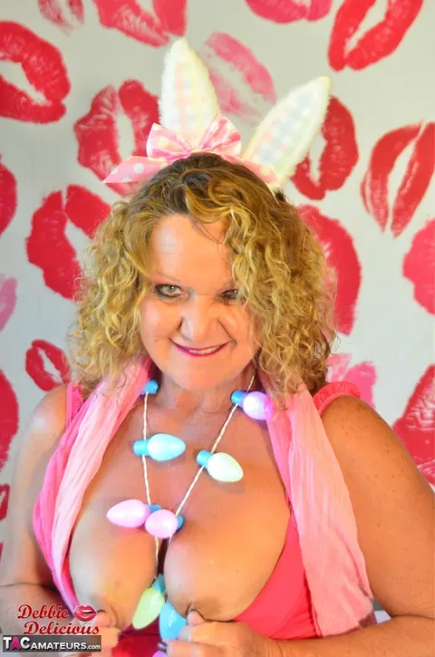 Debbie Delicious: Mature Curvy Brunette in Costume Poses and Shows Her Big Tits – photo 8 of 16