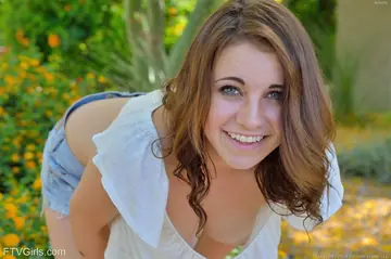 Busty Babe Fills Her Ass with a Vegetable Outdoors