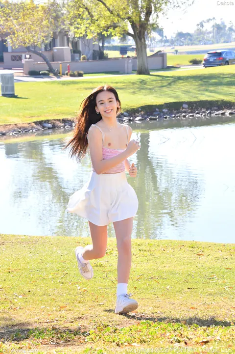 Dakota Tyler: Petite Amateur Flashes Her Natural Tits and Handstands by the River – photo 6 of 20