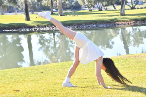 Dakota Tyler: Petite Amateur Flashes Her Natural Tits and Handstands by the River – photo 9 of 20