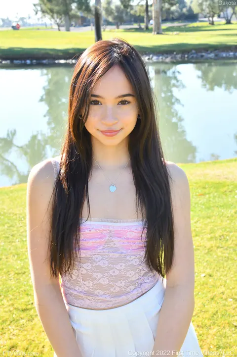 Dakota Tyler: Petite Amateur Flashes Her Natural Tits and Handstands by the River – photo 13 of 20