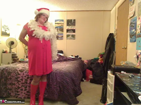 Misha Milf: Thick Redhead MILF Unwraps Christmas Outfit in Boots – photo 1 of 20