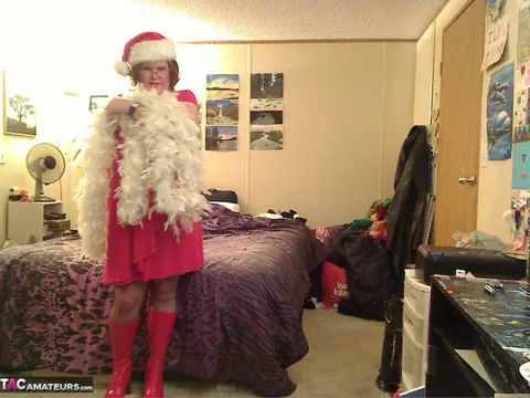 Misha Milf: Thick Redhead MILF Unwraps Christmas Outfit in Boots – photo 2 of 20