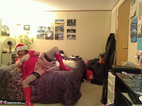 Misha Milf: Thick Redhead MILF Unwraps Christmas Outfit in Boots – photo 18 of 20