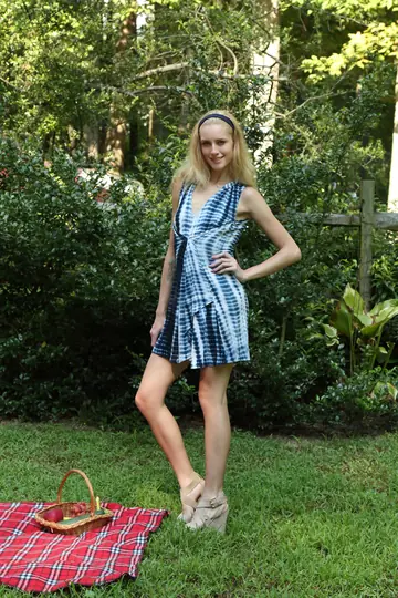 Tall Skinny Blonde Masturbates with a Toy and Fists Herself Outdoors