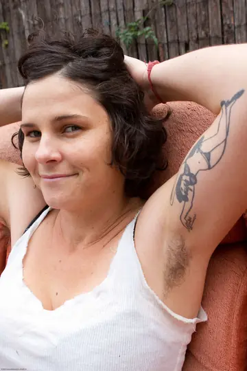Curly BBW Strips Out of Her Jeans and Spreads Her Hairy Pussy