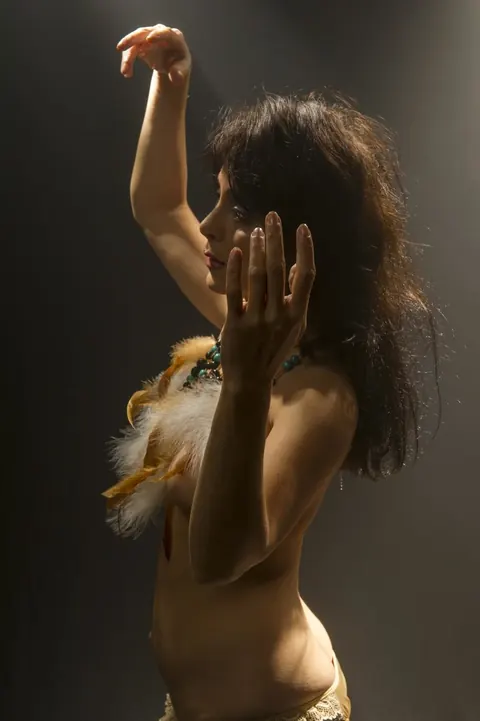 Short-Haired Woman with Small Tits Dances Nude – photo 4 of 21