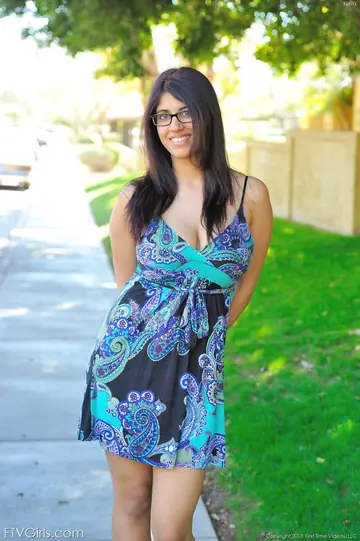 Asian Brunette Reveals Her Big Tits on Public Sidewalk