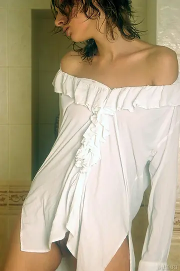 Brunette Displays Her Hairy Pussy in the Bathroom