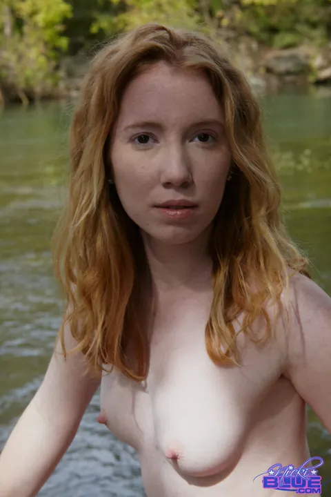 Nicki Blue: Redhead Strips Out of Her Skirt and Panties in a Stream – photo 8 of 15