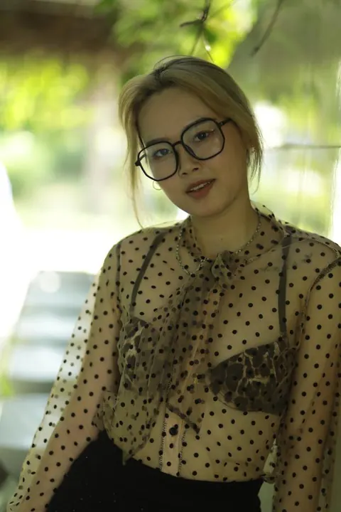 Asian Blonde in Glasses and Skirt Strips Outdoors – photo 15 of 21