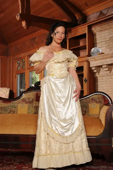Melissa Monet – Brunette MILF Sheds Her Costume and Corset to Reveal Her Pussy