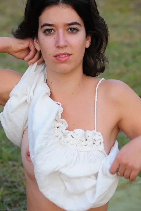 Latina Strips Nude and Poses for Erotic Photos – photo 2 of 21