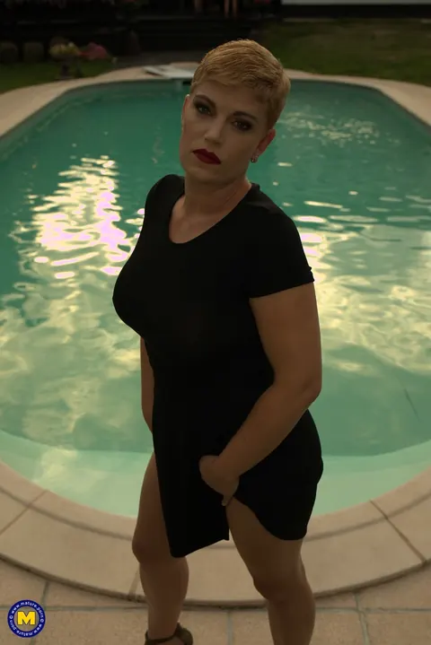 Lina Lux: Tall Mature French Woman Poses in Uniform by the Pool – photo 15 of 21