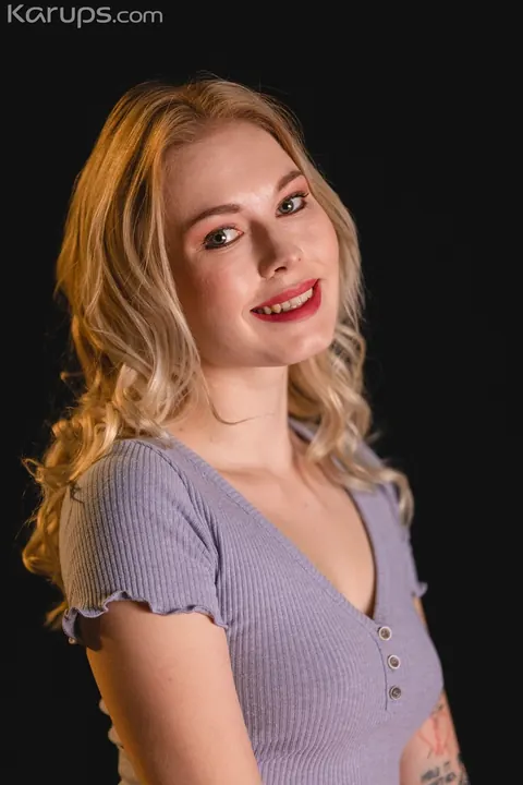 Mimi Cica: European Blonde Shows Off Her Tattoos and Piercings Clothed – photo 8 of 21