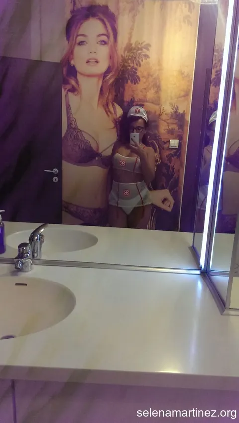 Thick Latina MILF in Nurse Lingerie Poses Bent Over a Mirror – photo 9 of 20