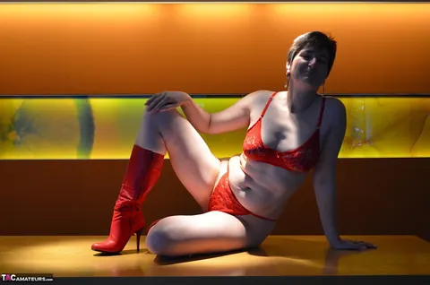 Mature Curvy Brunette in Lingerie and Boots Strips Naked – photo 5 of 16
