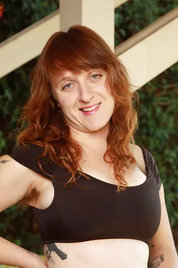 Mature Redhead Bares Her Big Tits and Hairy Pussy Outdoors