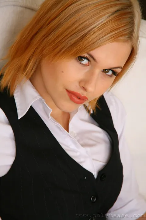 Iga Wyrwal: Redhead with Big Tits Strips Out of Her Uniform and Stockings – photo 5 of 21