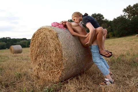 Couple Fucks Doggy Style Against a Hay Bale in the Forest – photo 15 of 20