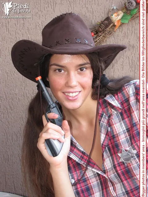 Sweet Carla: Tattooed Brunette in Shorts and Boots Shows Off Her Hose-Covered Feet – photo 3 of 16