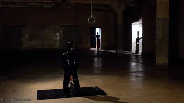 Brunette in Latex Dominates Her Slave with a Strap-On