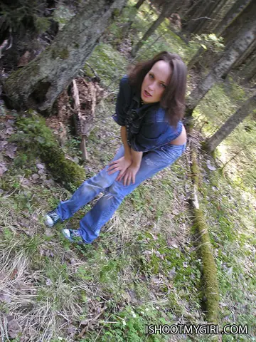Woman in Jeans Gives an Outdoor Blowjob in the Forest