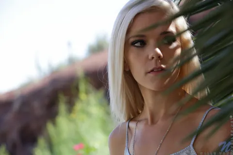 Halle Von: Blonde in a Skirt Pulls Down Her Panties and Kisses Outdoors – photo 1 of 10