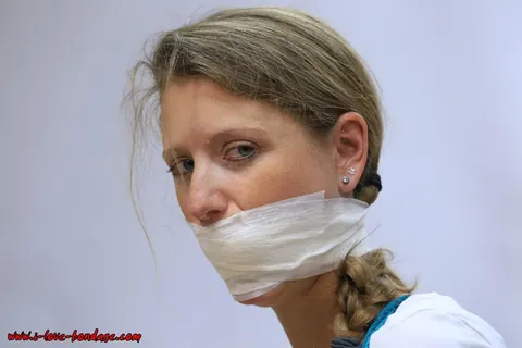 Woman in a Skirt with Pigtails Bound, Gagged and Spreading – photo 3 of 16