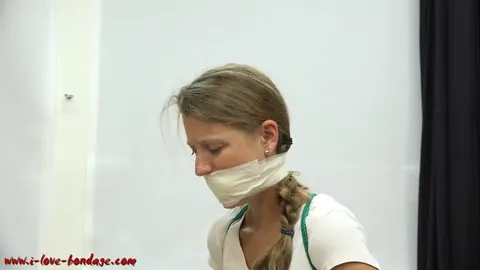 Woman in a Skirt with Pigtails Bound, Gagged and Spreading – photo 14 of 16