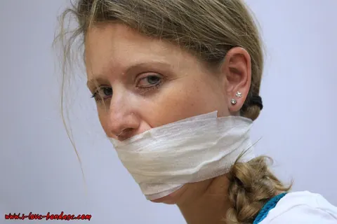 Woman in a Skirt with Pigtails Bound, Gagged and Spreading – photo 11 of 16