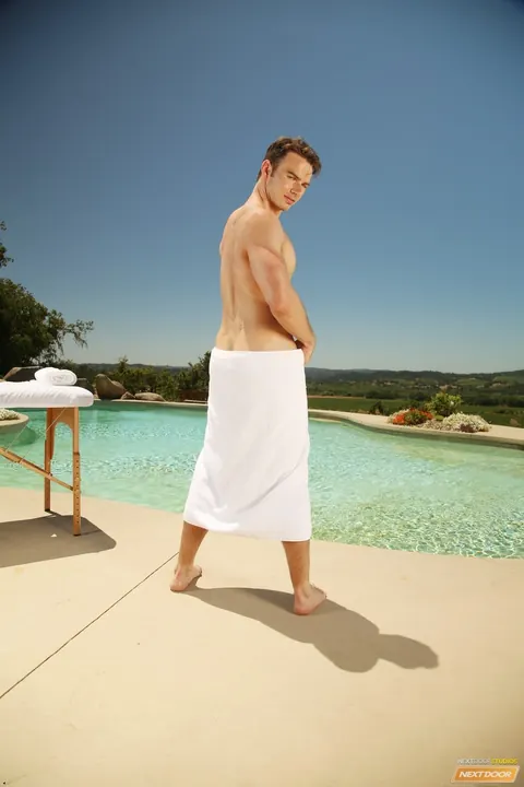 Three Men Kiss and Spit Roast a Stud Poolside – photo 1 of 21