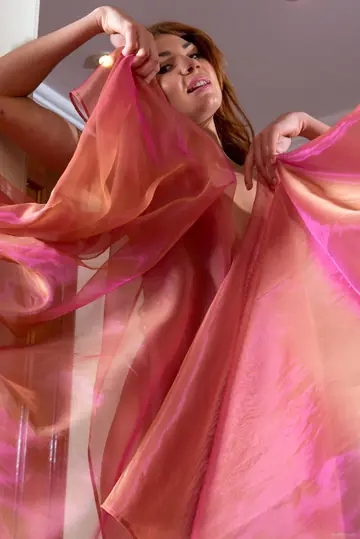 Geni A – Tall Redhead with Big Natural Tits Spreads Her Shaved Pussy