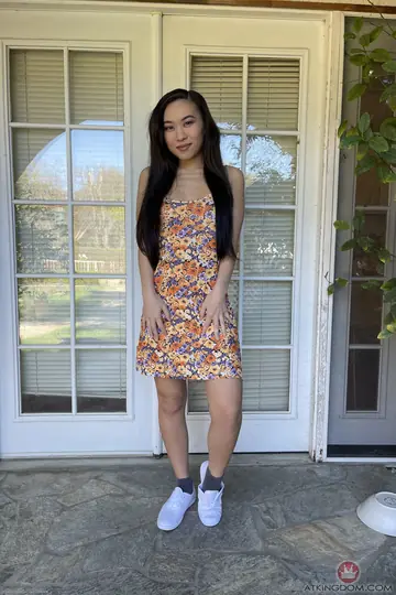 Skinny Asian Brunette Spreads Her Pussy