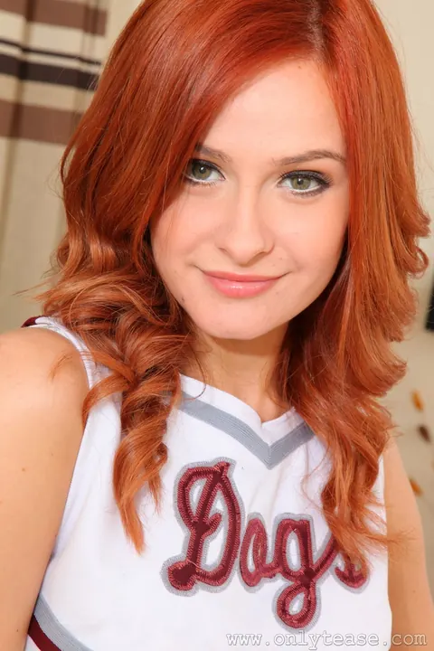 Elle Richie: British Redhead in Uniform and Pantyhose Strips and Shows Her Tattoo – photo 3 of 21
