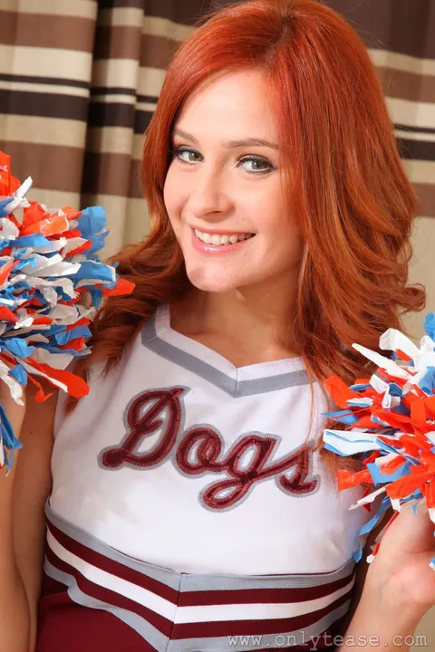 Elle Richie: British Redhead in Uniform and Pantyhose Strips and Shows Her Tattoo – photo 2 of 21