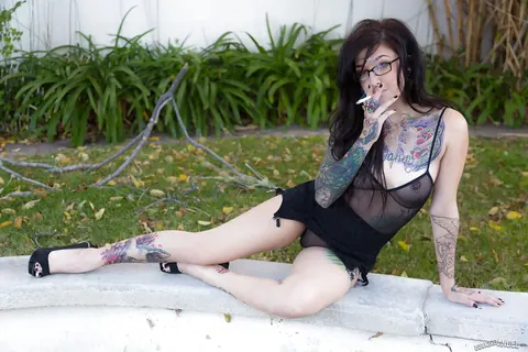 Kelsi Lynn: Pale Tattooed Brunette in Lingerie, Bikini and Glasses Spreads Outdoors – photo 1 of 16