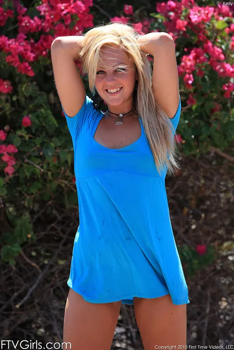 Tanned Blonde Strips Out of Her Dress by the Pool – photo 13 of 21